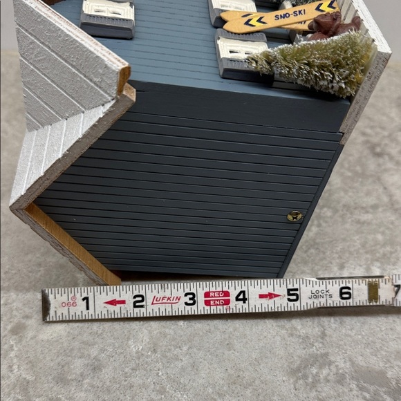 Animated musical ski chalet Winter Wonderland and door opens reveals skier - Picture 12 of 13